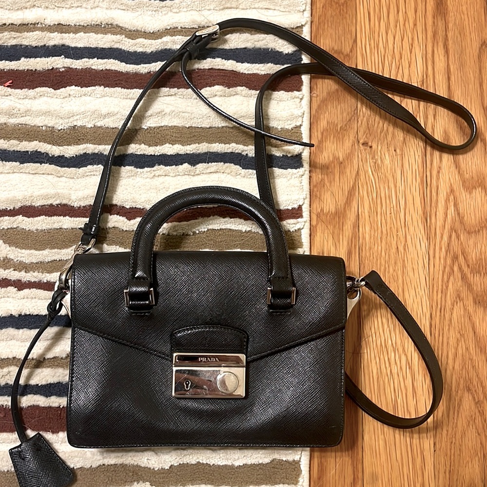 Authentic Prada Handbag with detachable crossbody strap.